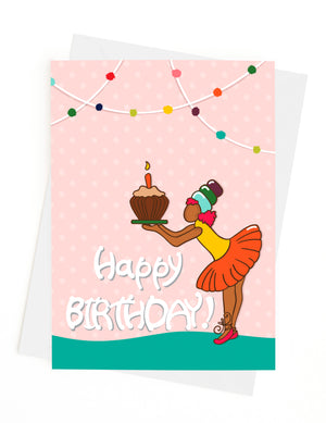 Birthday card, illustration of a girl holding a cupcake with a lit candle on top. Flat lay view.