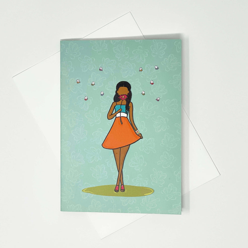 Greeting-Card-Girl-holding-a-daisy-flower-flat lay
