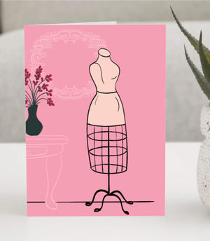Greeting Card of a pink dress form