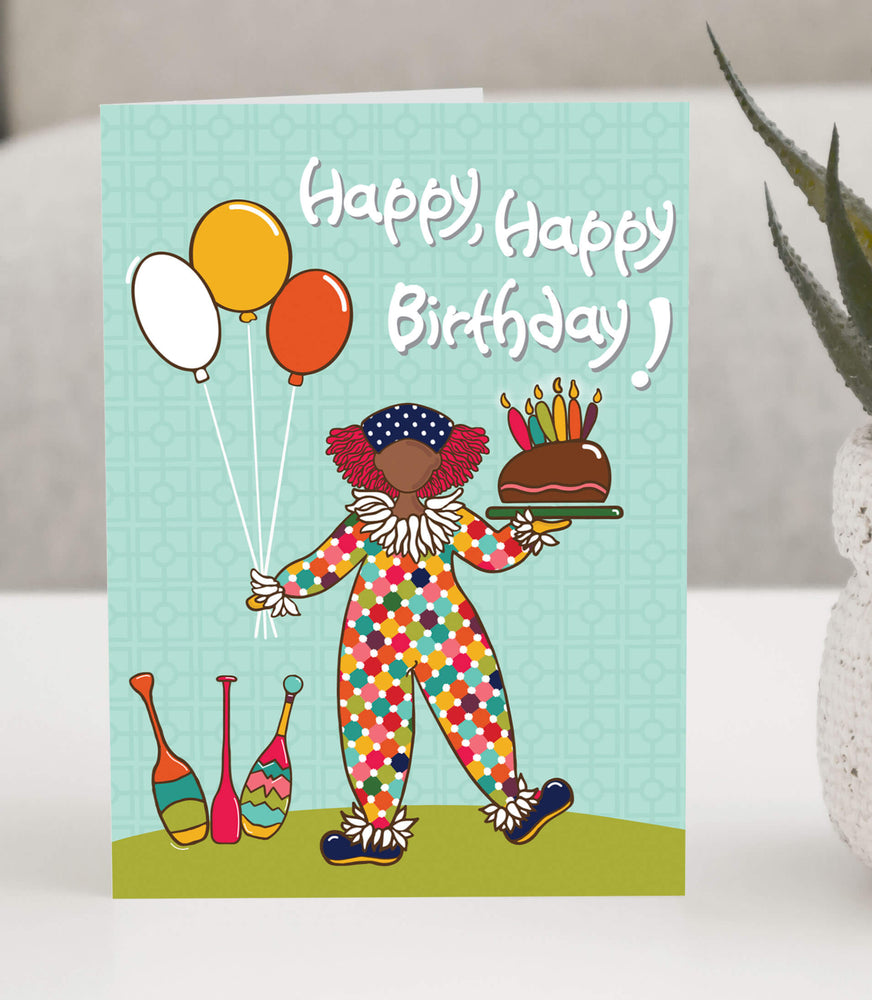 Birthday card by creative allure of a clown holding a cake