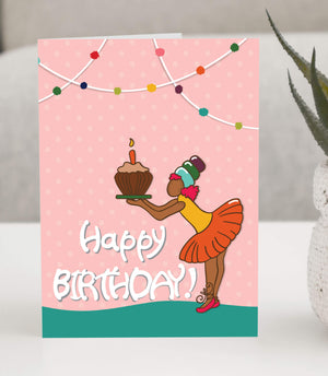 Birthday card, illustration of a girl holding a cupcake with a lit candle on top.