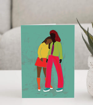 Heartfelt greeting card featuring an illustration of two friends embracing in a moment of support and closeness. 